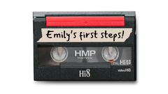 8mm tape labeled Emily First Steps