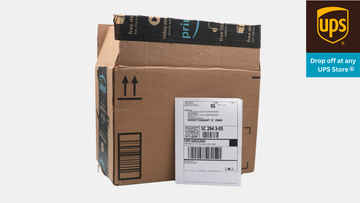 Heirloom prepaid shipping label on an open box at UPS